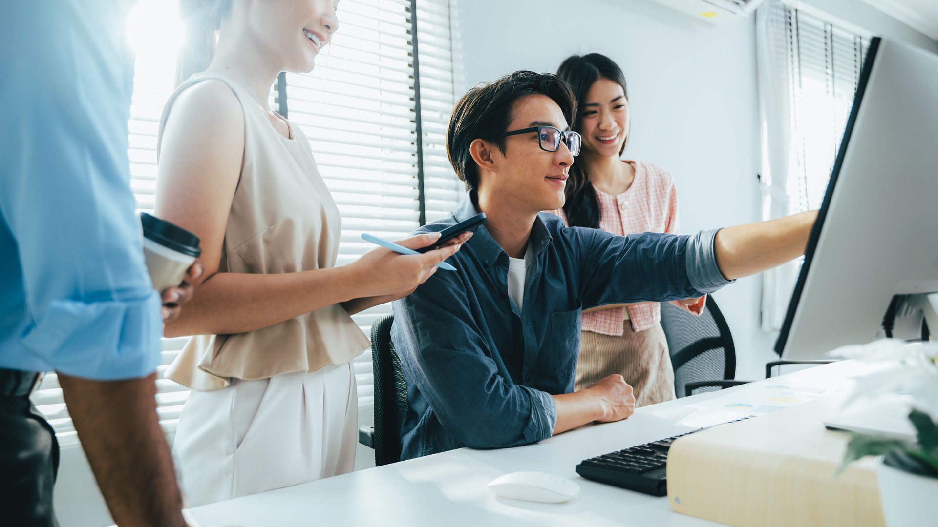Group of business people working together at modern office, Business team meeting and brainstorming at company, Employees using laptop working with business project